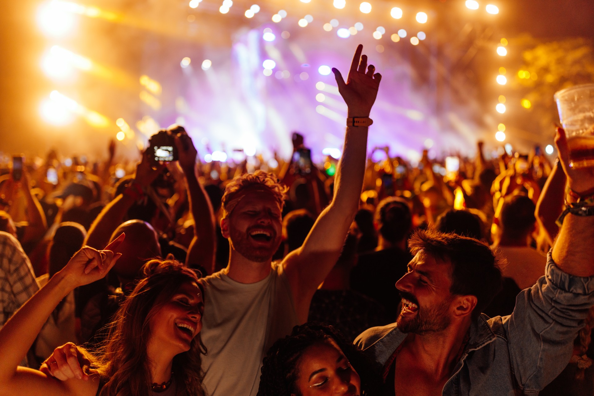 Friends dancing at the festival